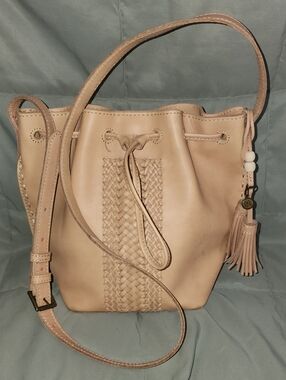 The Sak Beige Woven Leather Drawstring Crossbody Bag